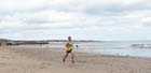 Andy Burn (Jarrow) finishing 2nd in the Pier to Pier Race, South Shields to Roker, Sunderland.